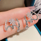 Boucles d'oreilles griffes scintillantes pour femme