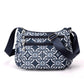 🔒🎒 Sac bandoulière nylon voyage – Multi-poches, fermeture sécurisée, format compact mais spacieux, parfaite pour les escapades et le quotidien 🗺️☕